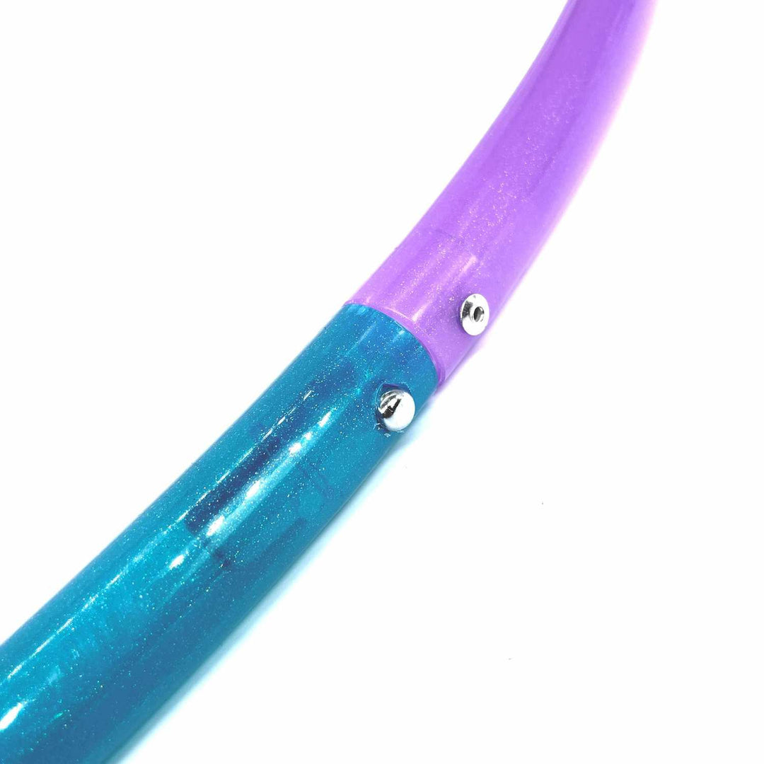 A Turquoise and purple 2 piece sectional hula hoop connection