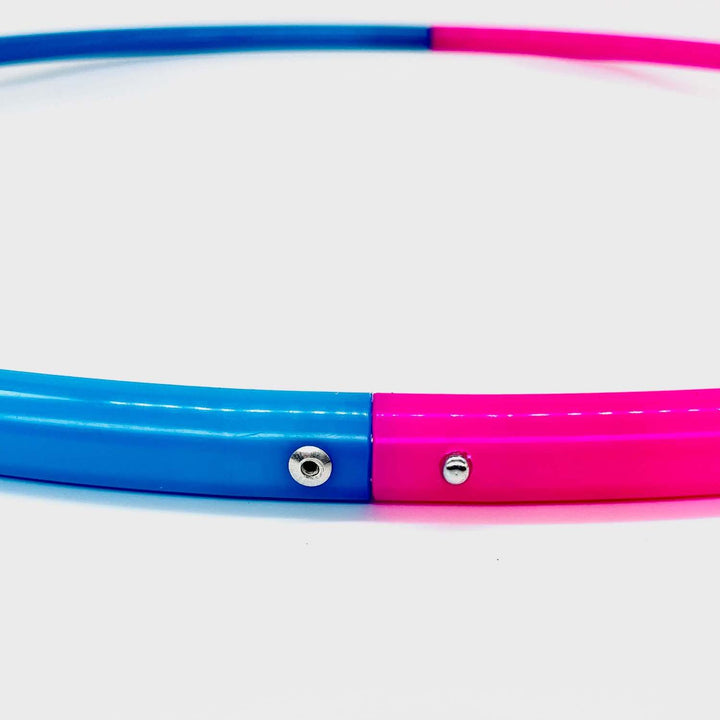 Nuclear pink and bioluminescent Blue sectional 2 piece hula hoop on a white background