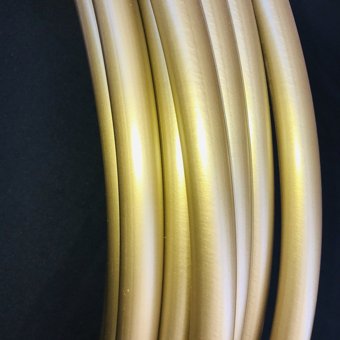 Champagne gold polypro hoop. Metallic gold shiny hoop tubing. Best polypro for hoop making