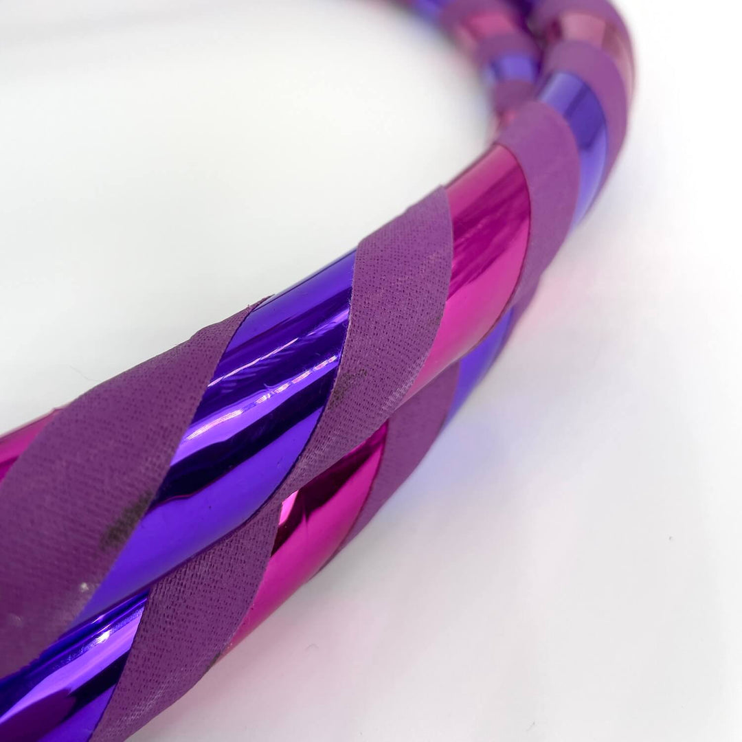 Purple mirror and fuchsia mirror striped hula hoop for hoop fitness and hoop dance