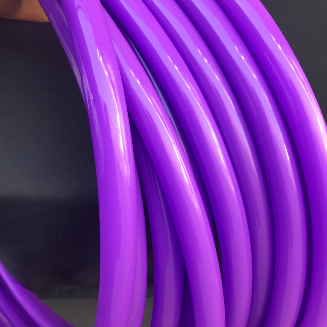 Radioactive UV Purple gloss polypro. UV purple shiny hula hoop tubing for making hoops. Purple polypro