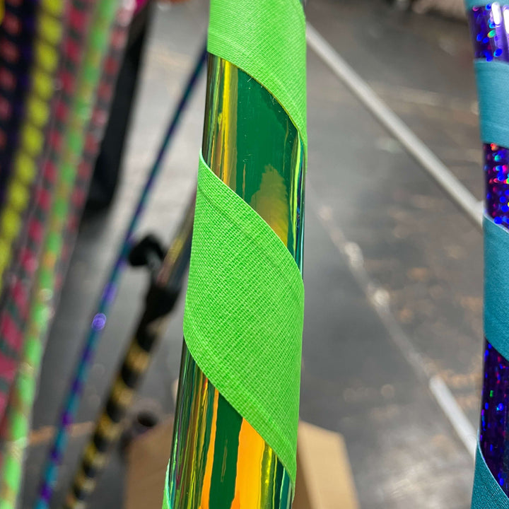 Adult beginner hula hoop taped in shiny lime and uv green grip tape 