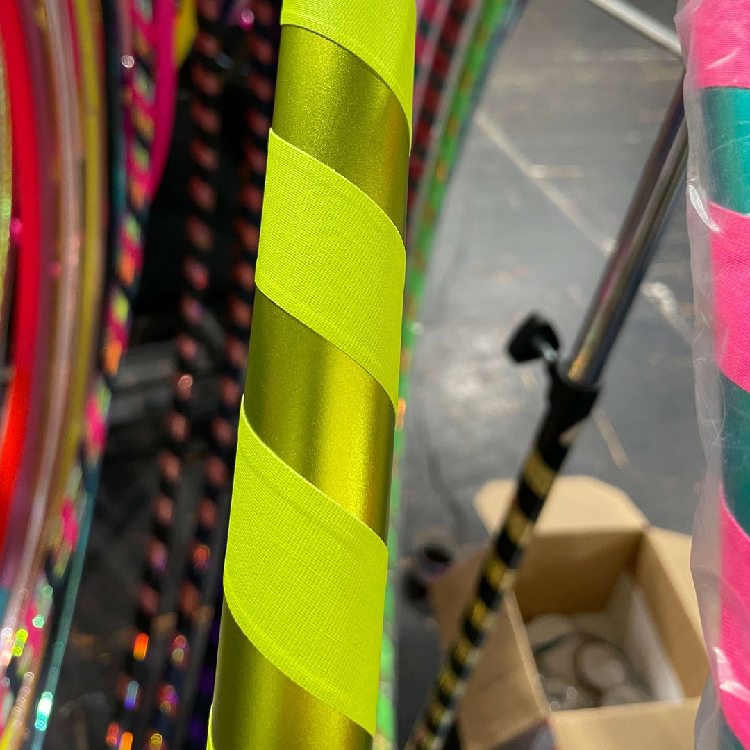 Beginner hula hoop for adults in Lime satin lustre tape and UV Yellow gaffer tape 